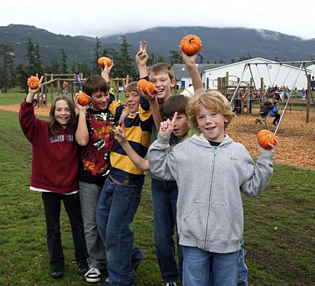 Students of Marny Gaylord's fourth grade celebrate finishing the Pumpkin Run.