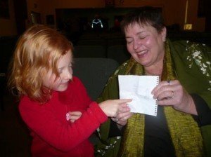 Susan Osborn receives a picture from Isabella