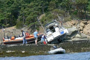 A U.S. Coast Guard skiff is among the boats that were blown aground when heavy winds blew through Fossil Bay on Sucia Island