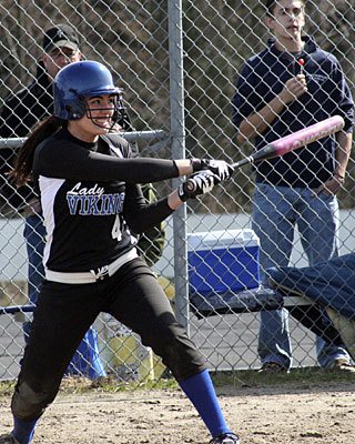 Lanie Padbury smacks a good one during the game.