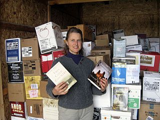 Ulanah McCoy with the thousands of books for the Winter Book Sale.