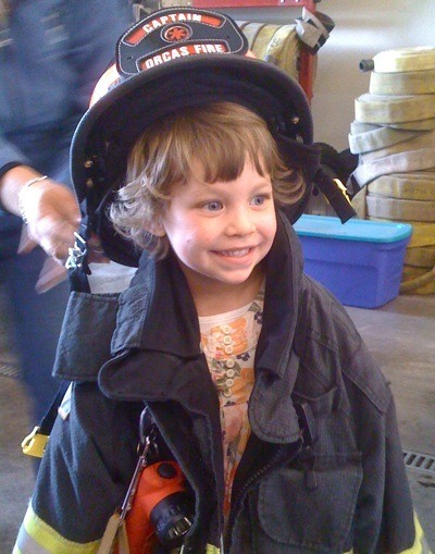 Kiyomi Farish and 25 other pre-school students from Children's House visited the Eastsound Fire Station as part of Fire Prevention Education. The Junior Firefighters learned about life at the fire station