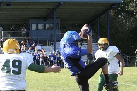 Tyler Nigretto makes the interception for the Vikings against Darrington on Saturday.