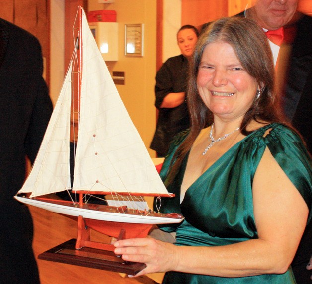 Multiple year Sailor of the Year Betsy Wareham receives her award.