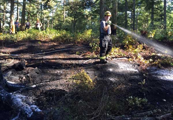 Orcas Fire and Rescue crews responding to the brush fire.