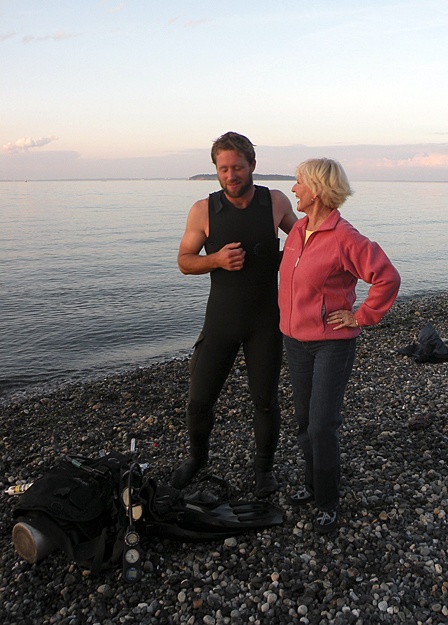 Zackarya Leck with Karen Schubert after he patched the boat.