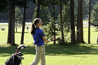 Cetacea Stanton of Orcas takes her shot onto a green.