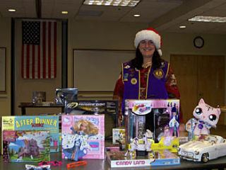 Veronica San Martin with some of the toys being given this year.