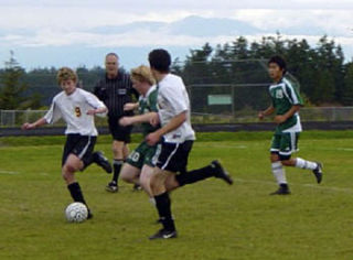 Lopez soccer team controls the ball as they plan against North Sound Christian.