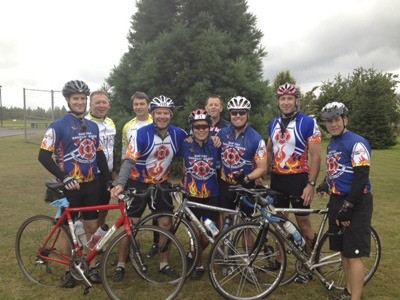 Kevin O’Brien is pictured above (fourth from the left) with his team.