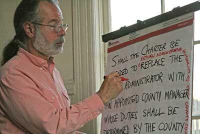 San Juan Island's Ron Zee keeps track of the wording as San Juan County's Charter Review Commission finalizes its list of recommendations for changes to the structure of county government