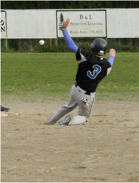 A Viking baserunner slides into second base.