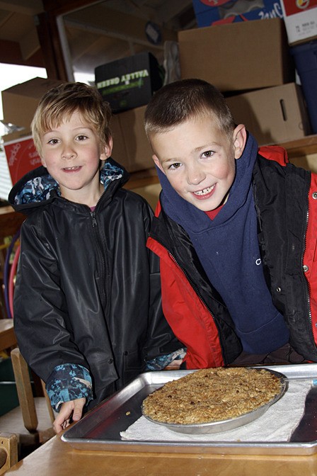 Finn Rubottom and Will Stephens enjoying some apple crisp.