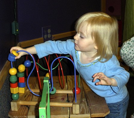 Sylvia Johnson keeps busy at The Funhouse playgroup.