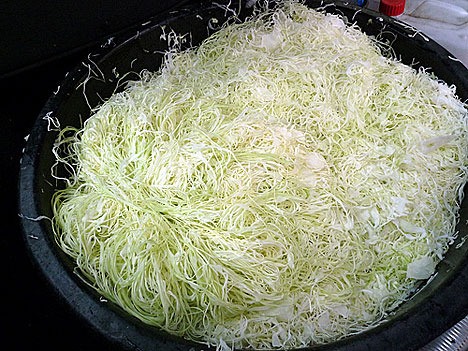 Shredded cabbage destined for sauerkraut.