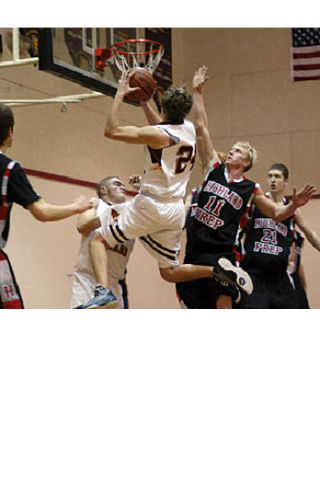 Top: Lobo Alex Buffum goes up for the shot. Aly Hodges photo. Right: Alex Buffum reaches leaps for the score. Deanna Brant photo.