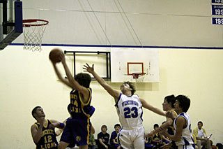 A Viking leaps for the block.