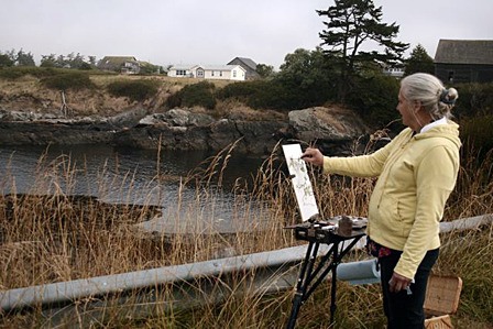 Artist Dianne Garner painting on Lopez Island.