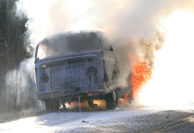 The engulfed bus was doused in foam.