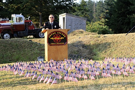 Fire Chief Mike Harris speaking at the memorial.