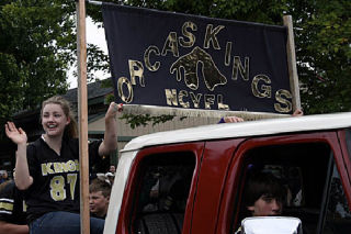 Jacqlyn Zier rides on the Orcas Kings float in the Fourth of July parade. Girls and boys are welcome on the team.