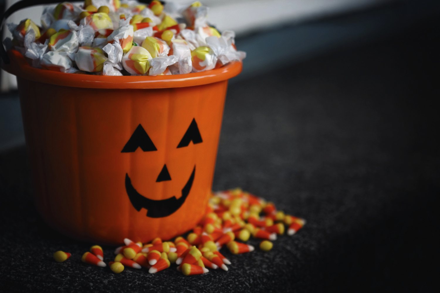 Bucket of Halloween Candy with Jack o Lantern