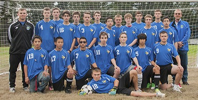 The Varsity soccer team. Back row: Coach Matt Stolmeier