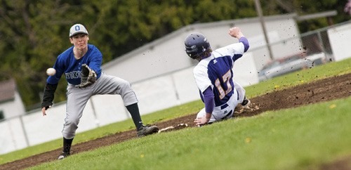 Viking Miles Harlow (left) catching a ball in the Concrete game on April 9.