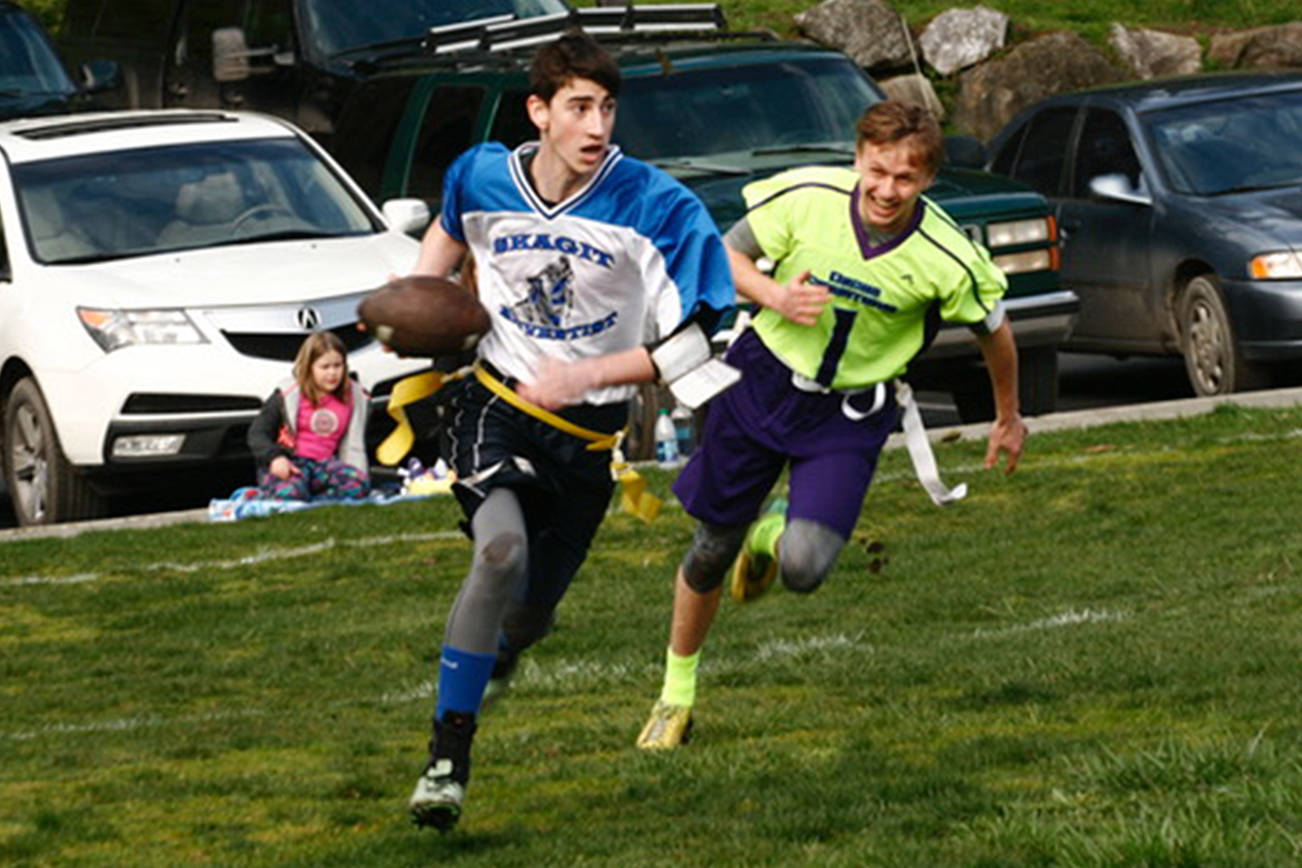 Skyler Gregg flushes the Skagit quarterback out of bounds