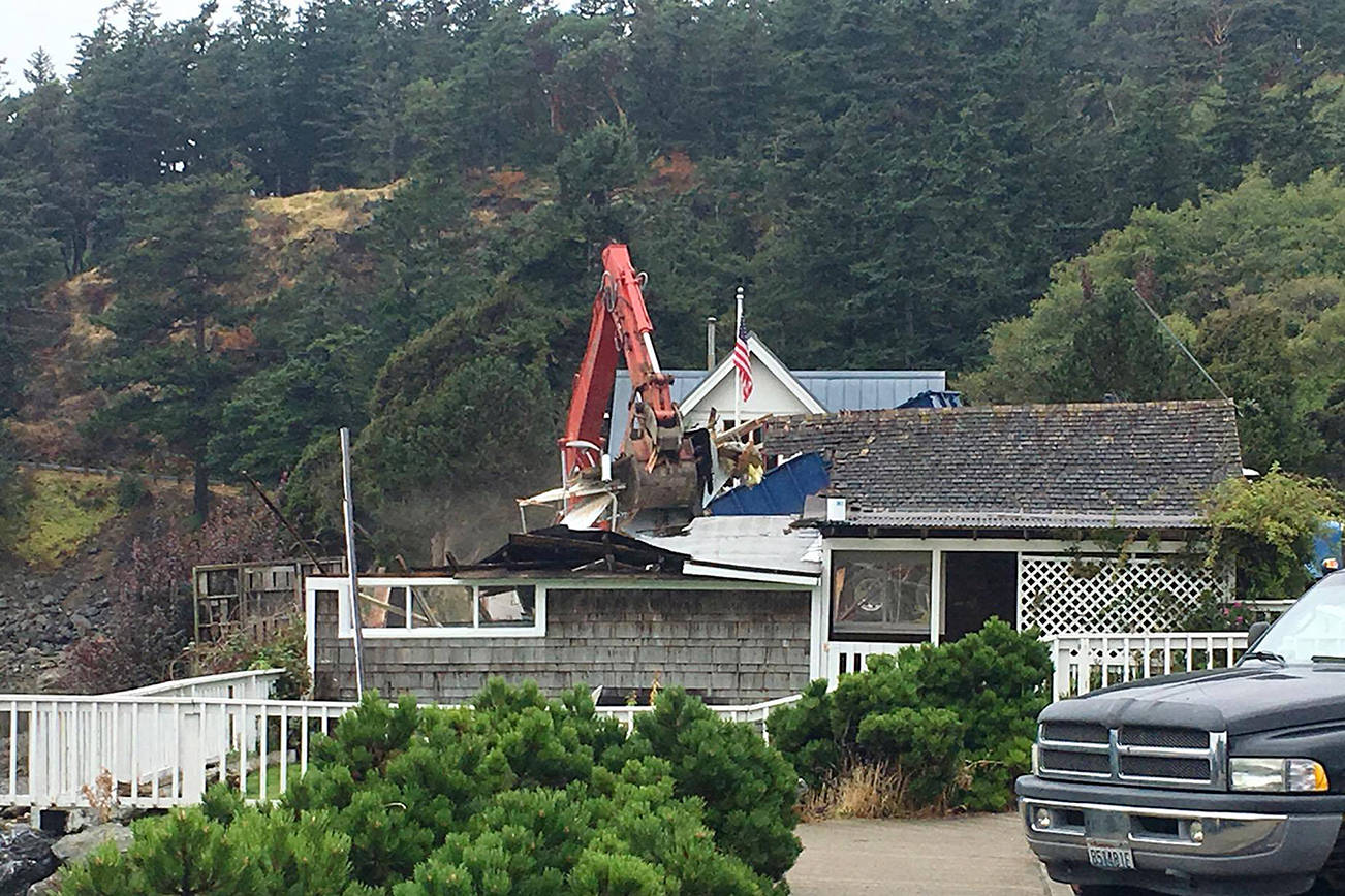 Historic waterfront cottage demolished