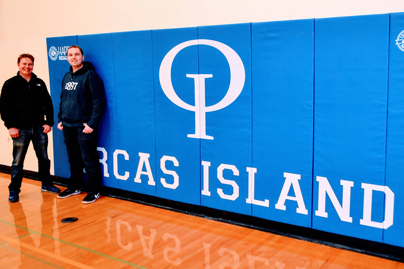 Island Market donates new wall mats to high school