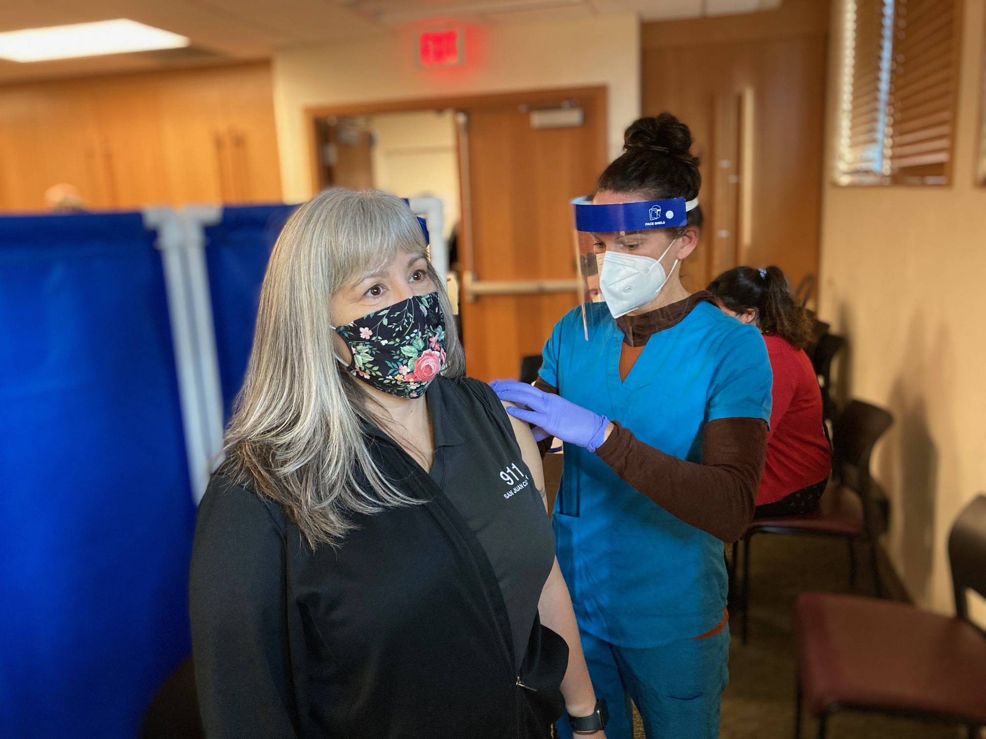 A San Juan County nurse gives the first vaccine in the county on Dec. 30. Per state and federal guidelines, initial vaccine distribution is limited to healthcare professionals, emergency responders, and long-term care facility staff and residents. (Contributed photo)