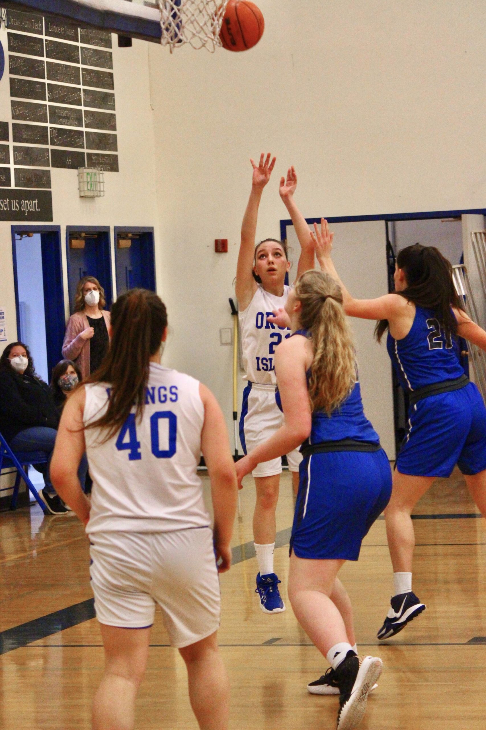 Corey Wiscomb photo
Junior Shaye Spinner pulls up with a baseline jump shot against the MVC Hurricanes.