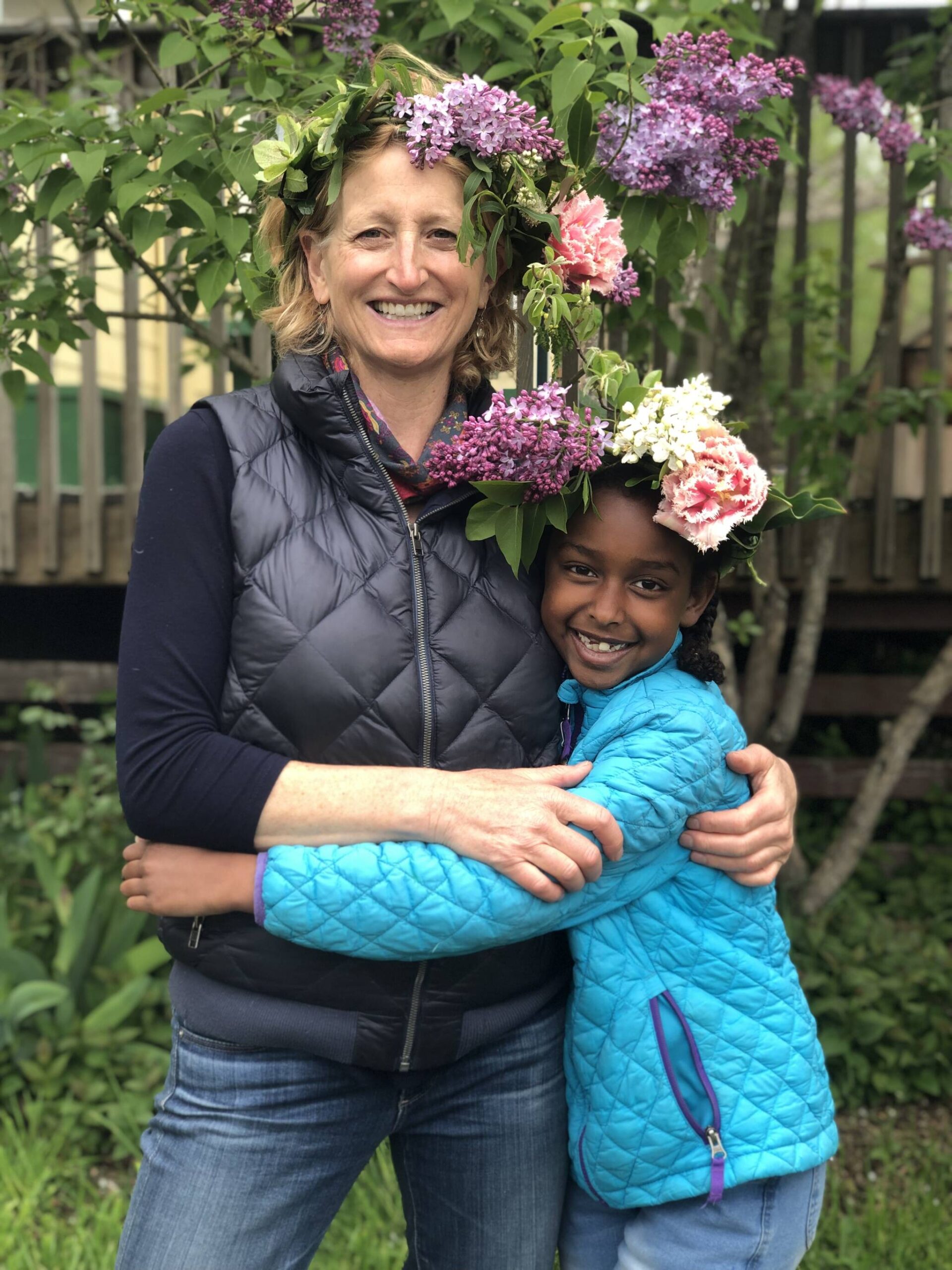 Laurie Racicot photo. 
Jessica and Edela in flower crowns made at Salmonberry School’s recent Spring Festival.