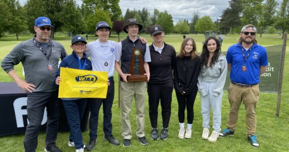 From left to right: Coach Chris Sutton, Joseph Anderson, Joshua Spinner, Sam Sutton, Lili Malo, Chloe Anderson-Cleveland, Vera Sasan, and coach Ryan Kennedy.