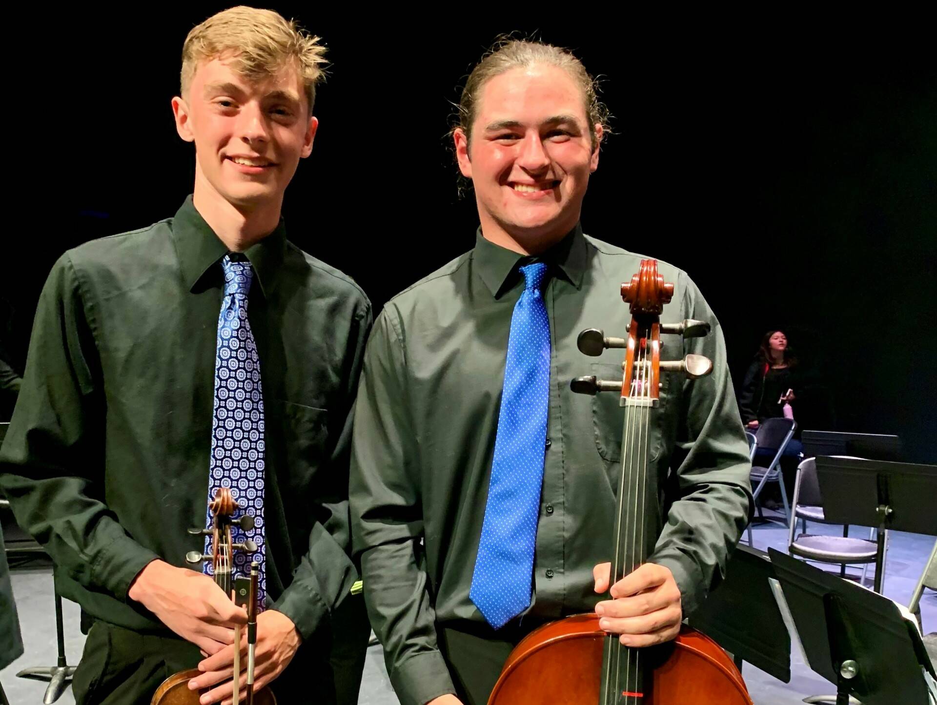 OIHS Strings graduates (left to right): Ethan Moss and Moose Kinsey