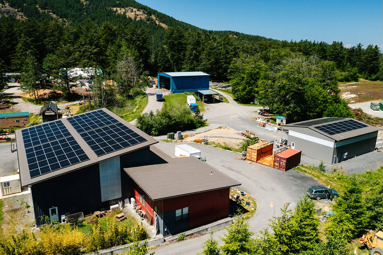 The Exchange (left) and baler building (right) have solar panels that will provide double the amount of electricity Orcas Recycling Services needs to operate.