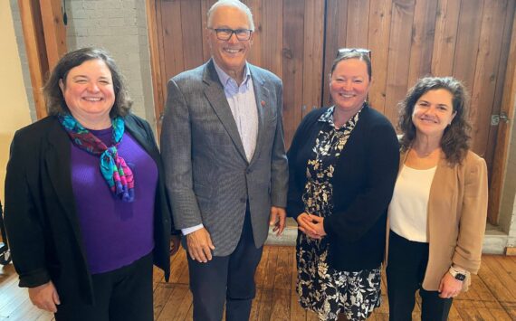 Contributed photo
Council member Cindy Wolf, Gov. Jay Inslee, Council member Christine Minney and Council Chair Jane Fuller.