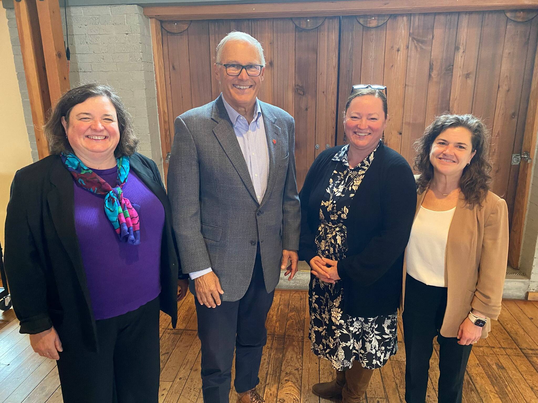 Contributed photo
Council member Cindy Wolf, Gov. Jay Inslee, Council member Christine Minney and Council Chair Jane Fuller.