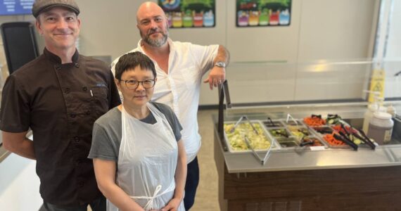 Colleen Smith Summers photo.
Left to right: Cafeteria staff Zach Holley and Bing Mowry and Food Service Director Madden Surbaugh.