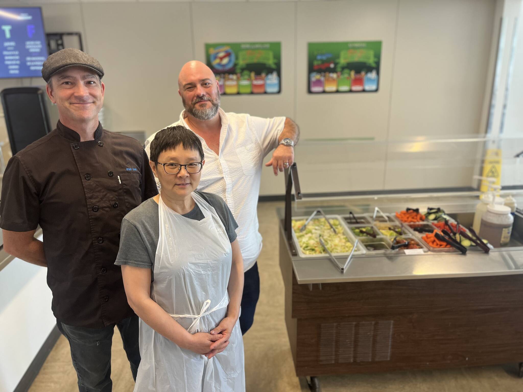 Colleen Smith Summers photo.
Left to right: Cafeteria staff Zach Holley and Bing Mowry and Food Service Director Madden Surbaugh.