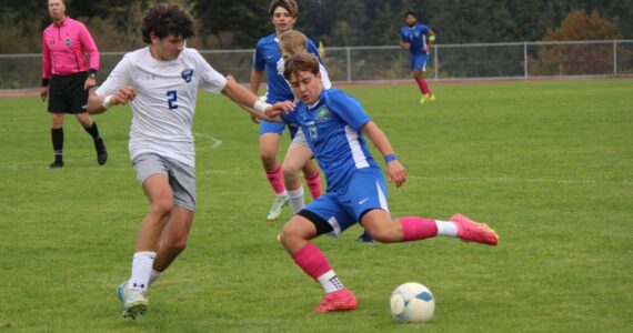 Cienna Richardson photo.
Andrzej “Andre” Kasperski during the game against MVC. Behind him is Viking Hayes Richardson and far right is Demetrio Salinas-Cruz.