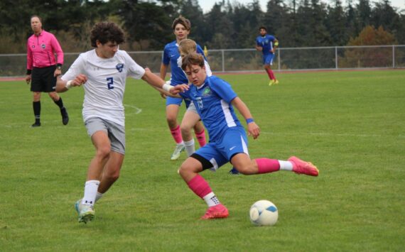 Cienna Richardson photo.
Andrzej “Andre” Kasperski during the game against MVC. Behind him is Viking Hayes Richardson and far right is Demetrio Salinas-Cruz.