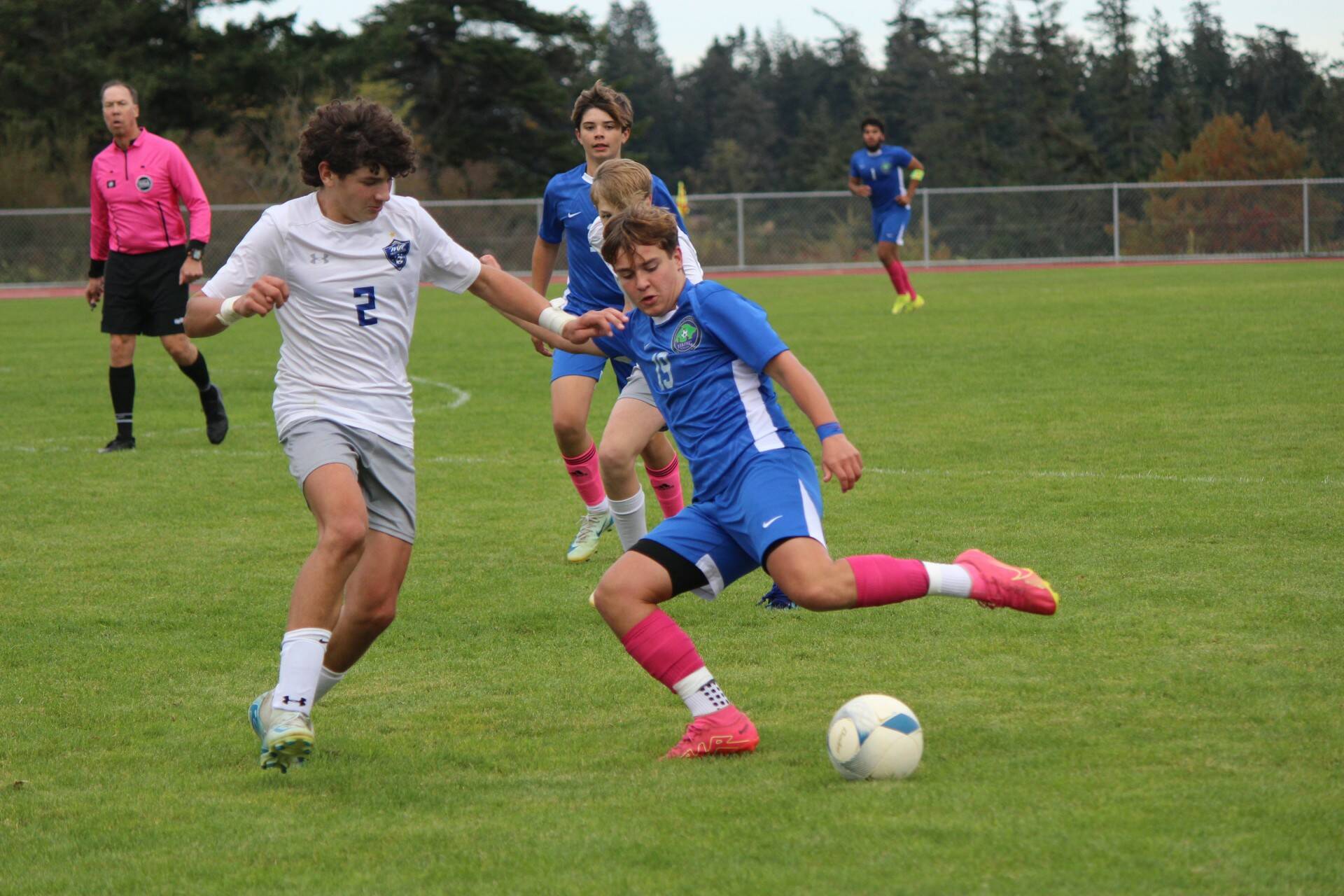 Cienna Richardson photo.
Andrzej “Andre” Kasperski during the game against MVC. Behind him is Viking Hayes Richardson and far right is Demetrio Salinas-Cruz.