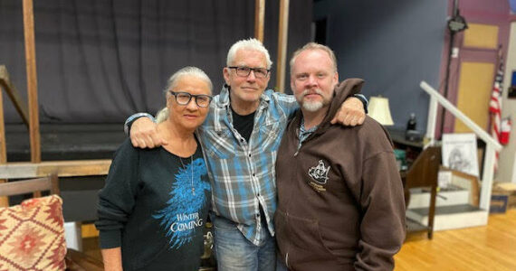 <em>Melinda Milligan, Director Robert Hall and R. Travis King at rehearsal. </em>