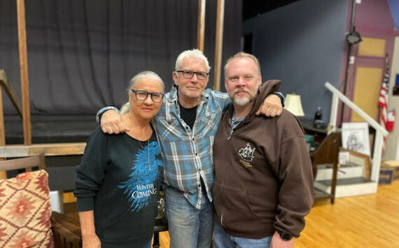 <em>Melinda Milligan, Director Robert Hall and R. Travis King at rehearsal. </em>