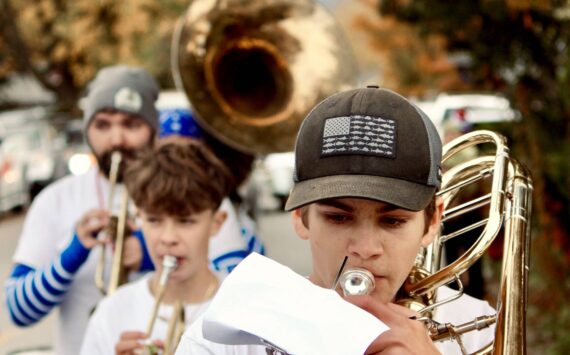 Corey Wiscomb photo.
Music Teacher Darren Dix (back left) lead the Marching Band through the streets of Eastsound and all the way to the stage on the Village Green where they performed for the Homecoming community festivities.