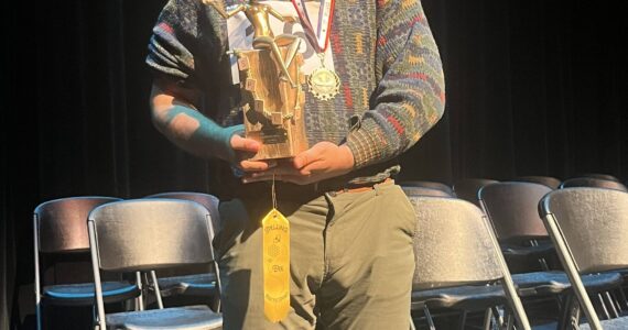 Colleen Smith Summers photo.
Pedro LopezDeVictoria with his spelling trophy.