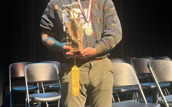 Colleen Smith Summers photo.
Pedro LopezDeVictoria with his spelling trophy.