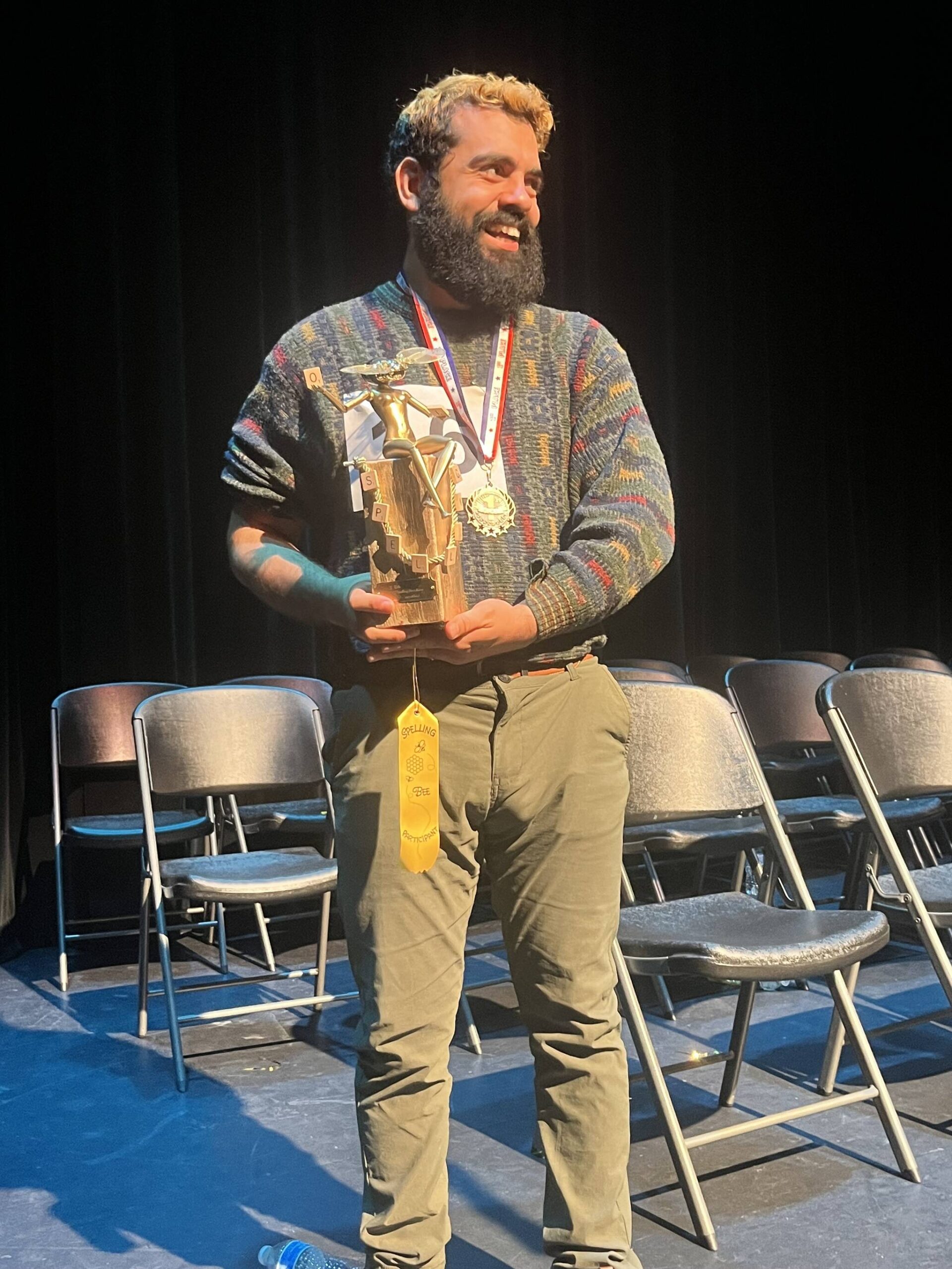 Colleen Smith Summers photo.
Pedro LopezDeVictoria with his spelling trophy.